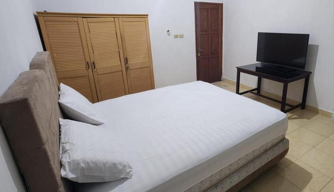 Permata Homestay Kotamobagu Mitra Reddoorz Экстерьер фото